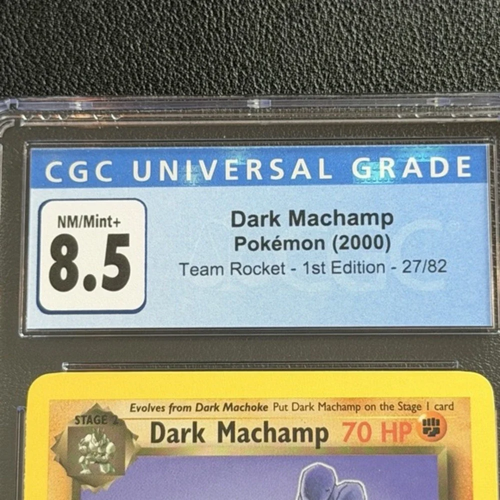 Pokemon Dark Machamp Non-Holo 1st Ed. 27/82 CGC 8.5 TCG Team Rocket 2000 WotC